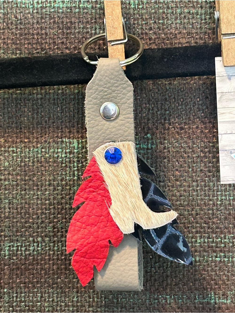 Leather Tassel Keychain with Red and Blue Feather Accent